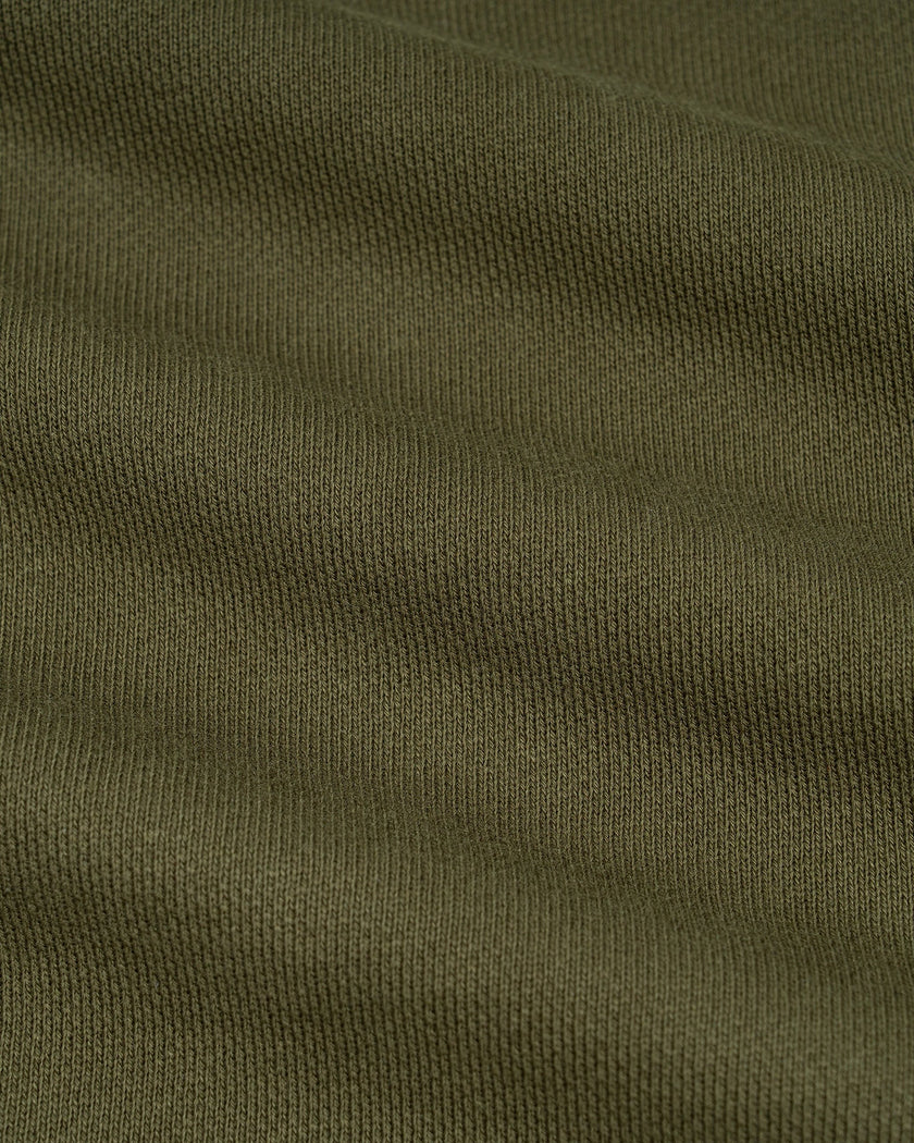 Closeup of army green cotton fabric on Camo Accent Hoodie