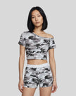 Model wearing the Light Blue Camo Off-Shoulder Crop Tee front view