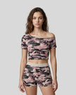 Model wearing the Pink Camo Off-Shoulder Crop Tee front view