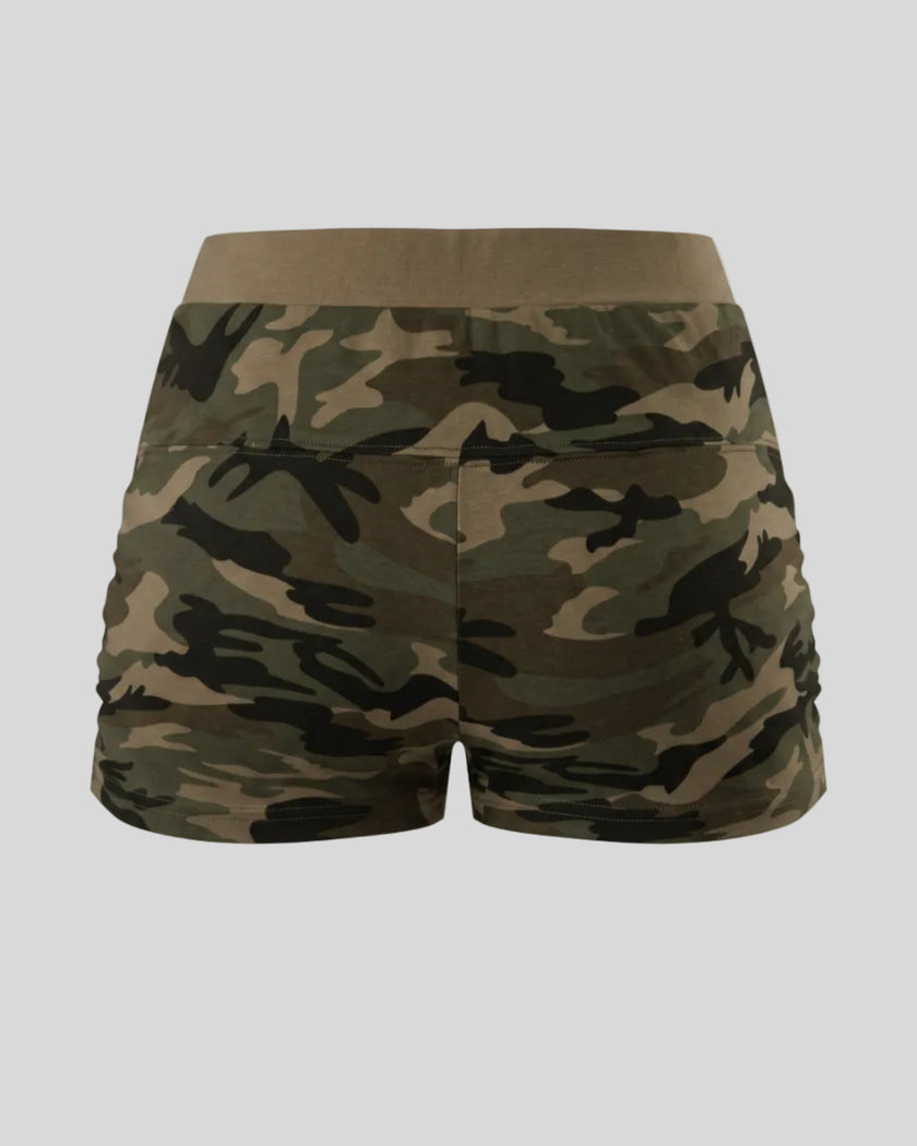 Women's camouflage slim shorts back view in Army Green Camo with elastic waistband and side ruching
