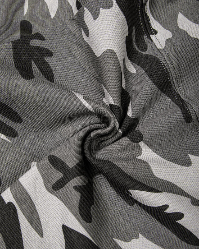 Exterior fabric close-up showing the camouflage print and soft stretch cotton texture