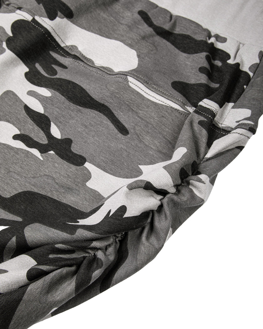 Side close-up showing the ruched detail and slim silhouette of the Gray Camo shorts