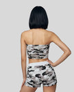 Back view of a model wearing the Camo Tube Top in Light Blue Camo