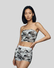 Model wearing the Camo Tube Top in Light Blue Camo, front mid-body view