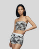 Model wearing the Camo Tube Top in Light Blue Camo, front mid-body view