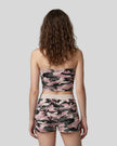 Back view of a model wearing the Camo Tube Top in Pink Camo