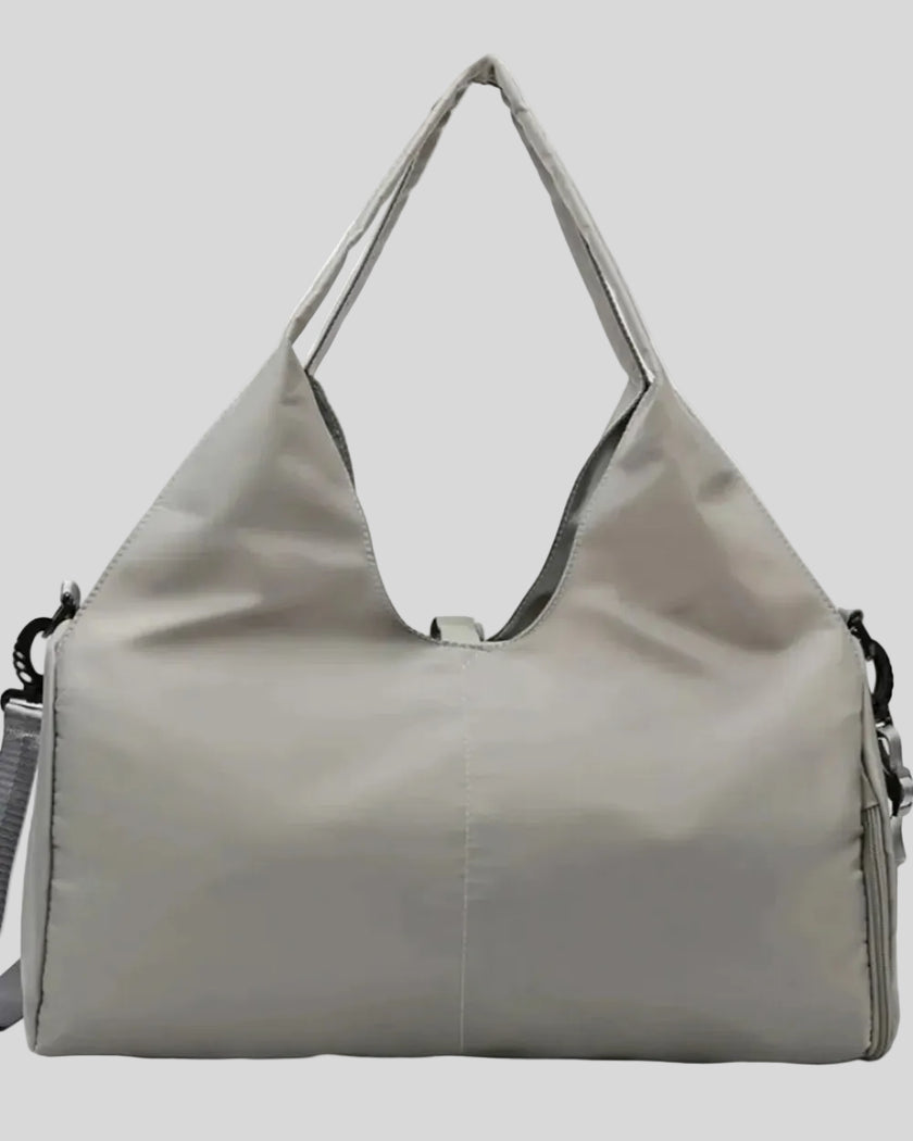 CarryForm Studio Bag in gray front view with structured silhouette and soft handles