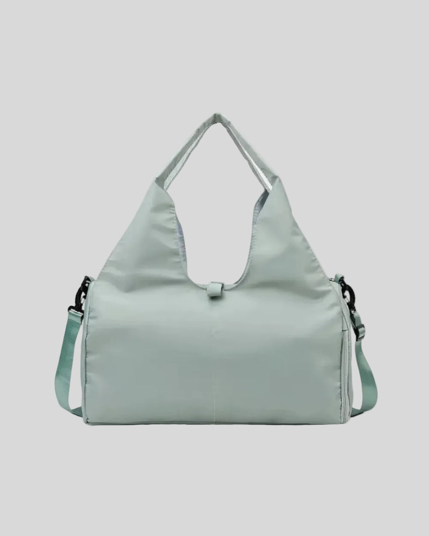 CarryForm Studio Bag in gum leaf front view with structured silhouette and soft handles