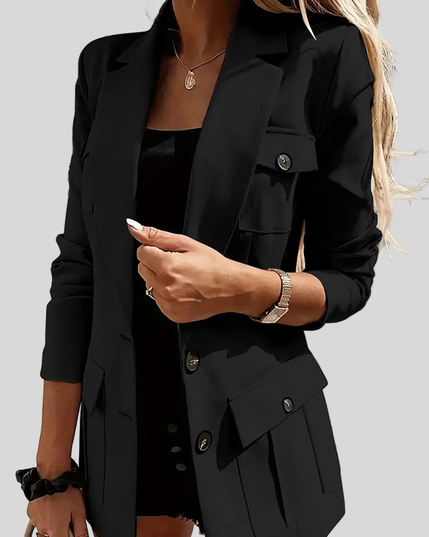 Closeup look of woman wearing black CityLine tailored blazer with structured lapel collar and pocket details