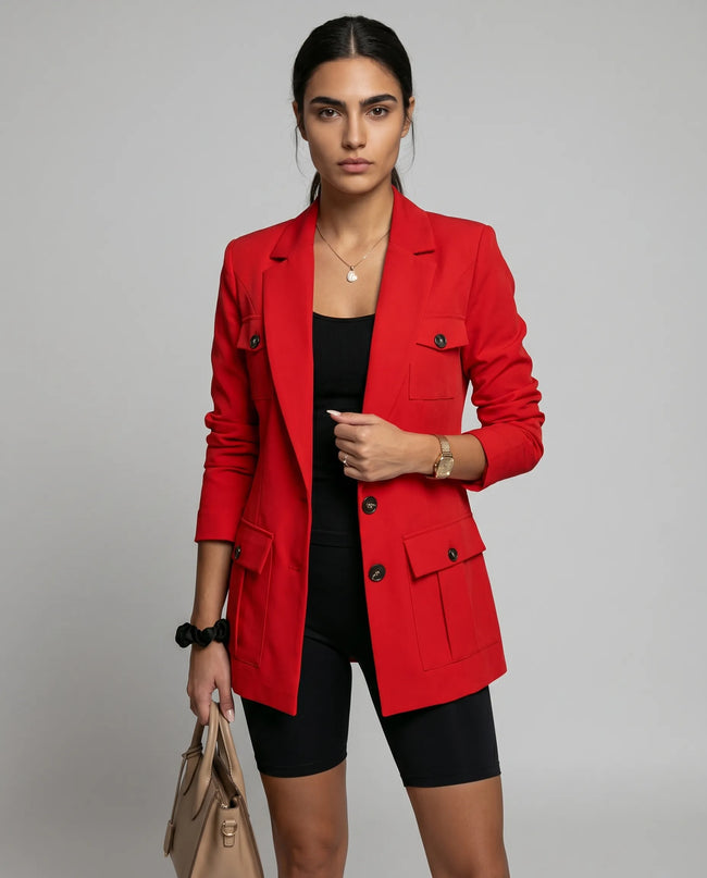 Woman wearing red CityLine tailored blazer with structured lapel collar and pocket details styled for elevated streetwear looks