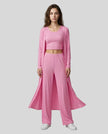 Woman wearing the CloudEase Lounge Set in fuchsia pink front view with cropped tank wide-leg pants and long sleeve cover-up
