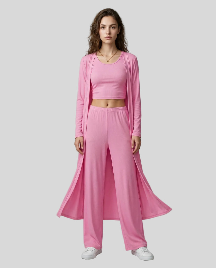 Woman wearing the CloudEase Lounge Set in fuchsia pink front view with cropped tank wide-leg pants and long sleeve cover-up