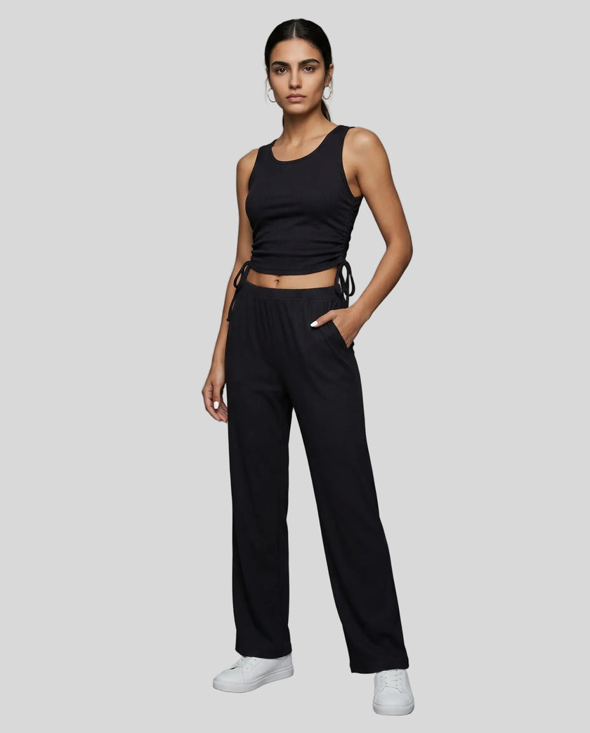 Front view of the CloudEase Lounge Set in black styled without the long sleeve cover-up
