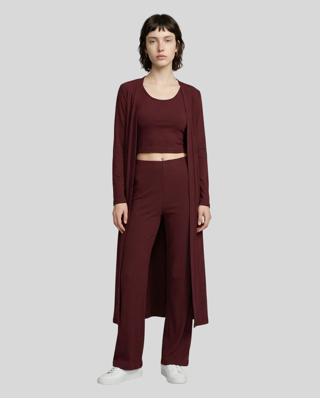 Woman wearing the CloudEase Lounge Set in burgundy front view with cropped tank wide-leg pants and long sleeve cover-up