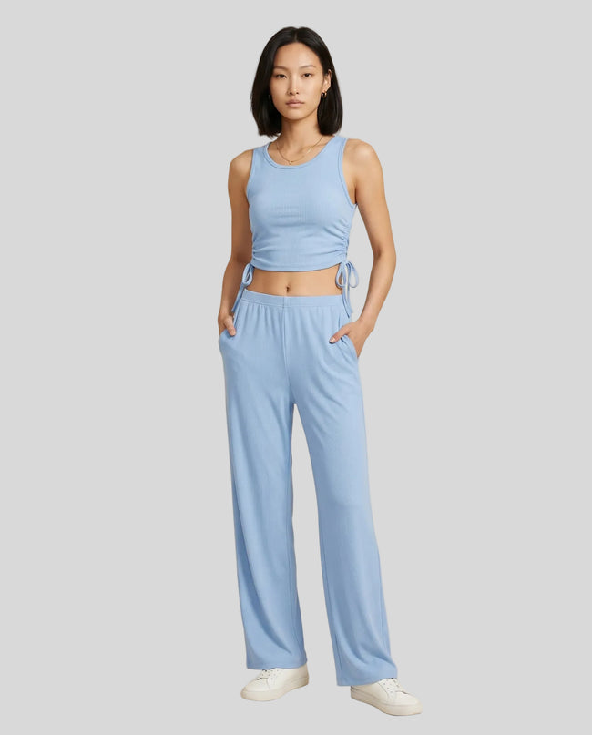 Front view of the CloudEase Lounge Set in light blue styled without the long sleeve cover-up