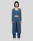 Woman wearing the CloudEase Lounge Set in navy front view with cropped tank wide-leg pants and long sleeve cover-up