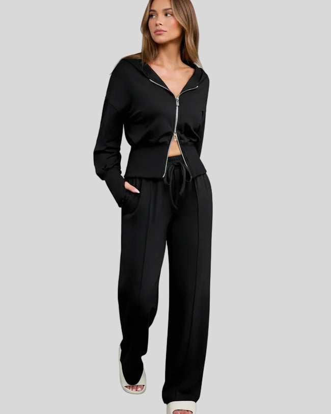 Black zip-up hoodie and lounge pant set worn front view