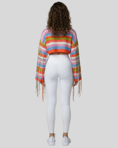 ColorRush Fringe Crop Sweater styled with Athlesi white leggings – full-body back view highlighting fringe sleeve movement