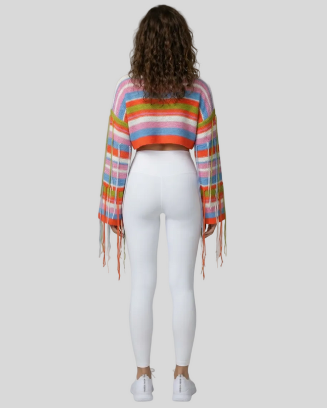 ColorRush Fringe Crop Sweater styled with Athlesi white leggings – full-body back view highlighting fringe sleeve movement
