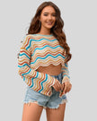 Front angled mid-body view of the Athlesi ColorRush Wave Knit Top showing wave stripe knit texture in tan