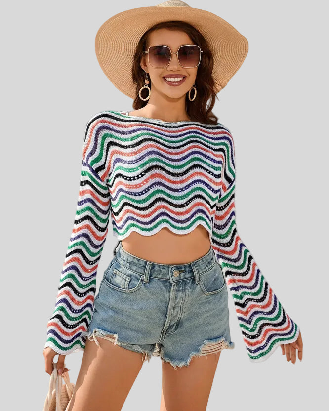 Front mid-body view of the Athlesi ColorRush Wave Knit Top in white multicolor stripe pattern.