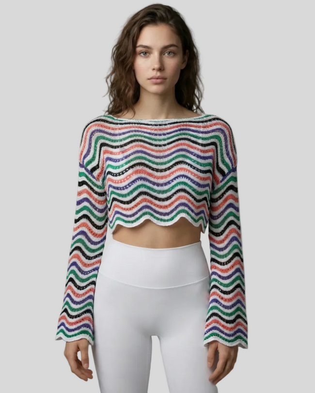 Front mid-body view of the Athlesi ColorRush Wave Knit Top in white styled as a modern layering piece over Athlesi activewear