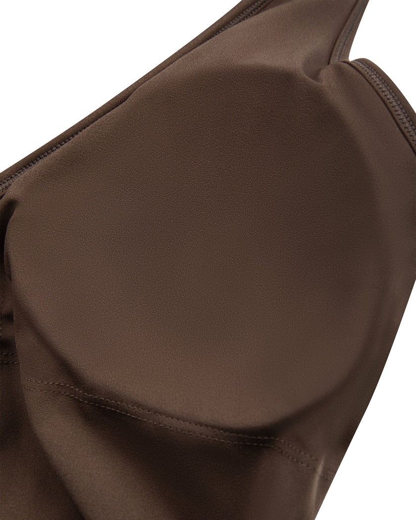 Close-up showing the removable chest padding inside the Contour Halter Yoga Tank Top in Brown