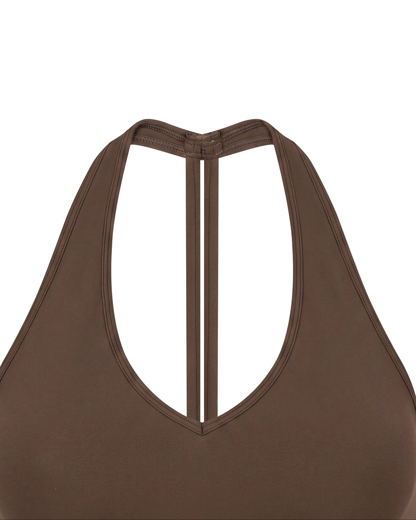 Close-up of the V-neckline on the Contour Halter Yoga Tank Top in Brown