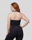 Mid body back view of woman wearing Contour Ruched Yoga Top in black