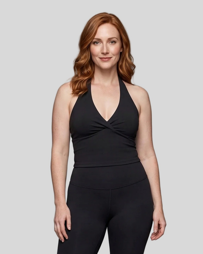 Mid body front view of woman wearing Contour Ruched Yoga Top in black