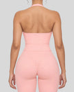 Mid body back view of woman wearing Contour Ruched Yoga Top in pink