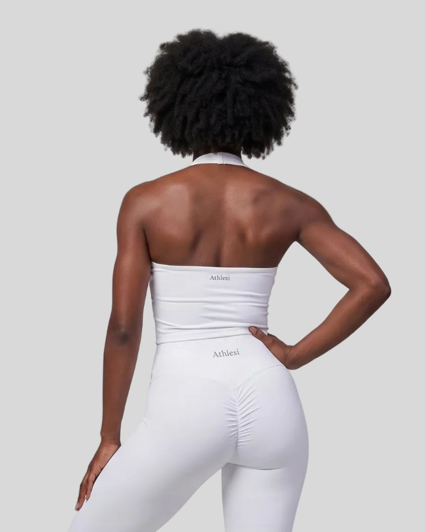 Mid body back view of woman wearing Contour Ruched Yoga Top in white