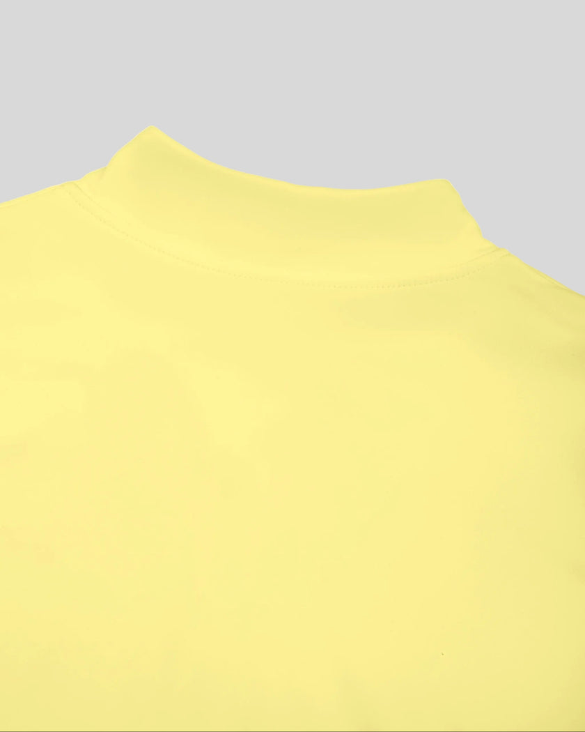 Closeup of back stand collar on Contour Yoga Jacket in yellow