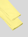 Closeup of thumbhole sleeve cuff on Contour Yoga Jacket in yellow