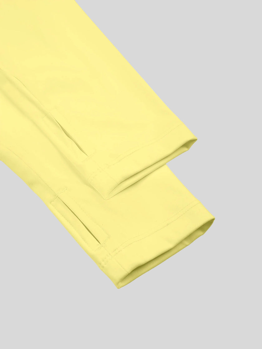 Closeup of thumbhole sleeve cuff on Contour Yoga Jacket in yellow
