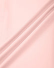 Closeup of smooth pink nylon stretch fabric on Contour Yoga Leggings