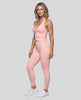 Full body front view of woman wearing Contour Yoga Leggings with matching Contour activewear in pink