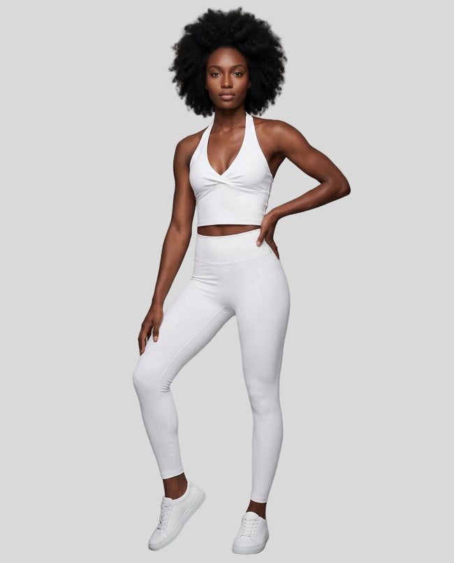 Full body front view of woman wearing Contour Yoga Leggings with matching Contour activewear in white