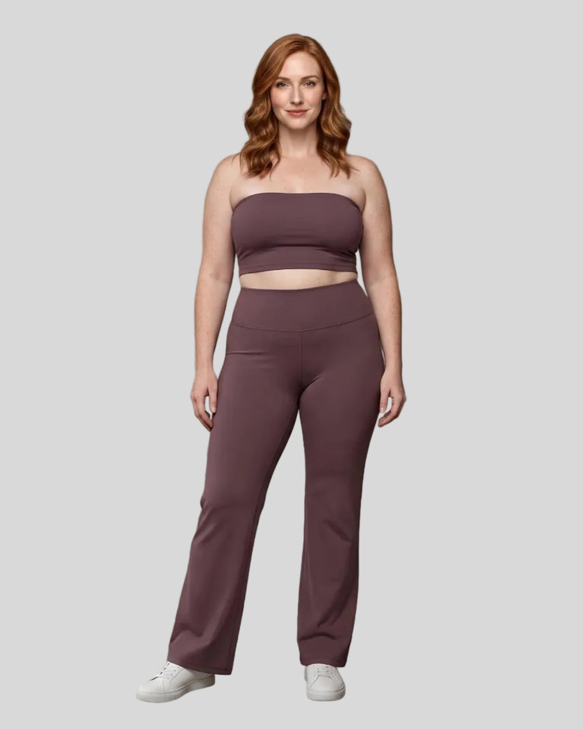 Model wearing the size large Contour Yoga Pants in Plum Purple, front full body view