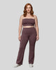 Model wearing the size large Contour Yoga Pants in Plum Purple, front full body view