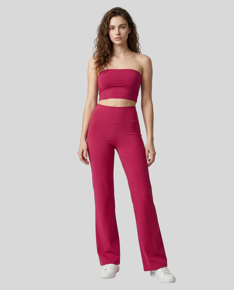 Model wearing the Contour Yoga Pants in Rose Red, front full body view