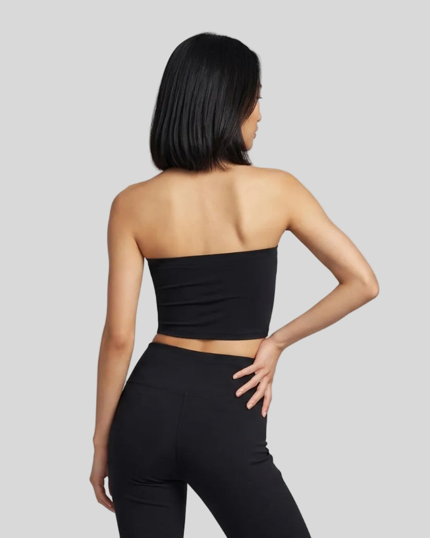 Back view of a model wearing the Contour Yoga Tube Top in Black