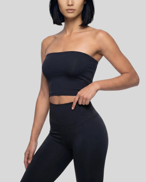 Model wearing the Contour Yoga Tube Top in Black, front view