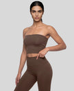 Model wearing the Contour Yoga Tube Top in Brown, front view