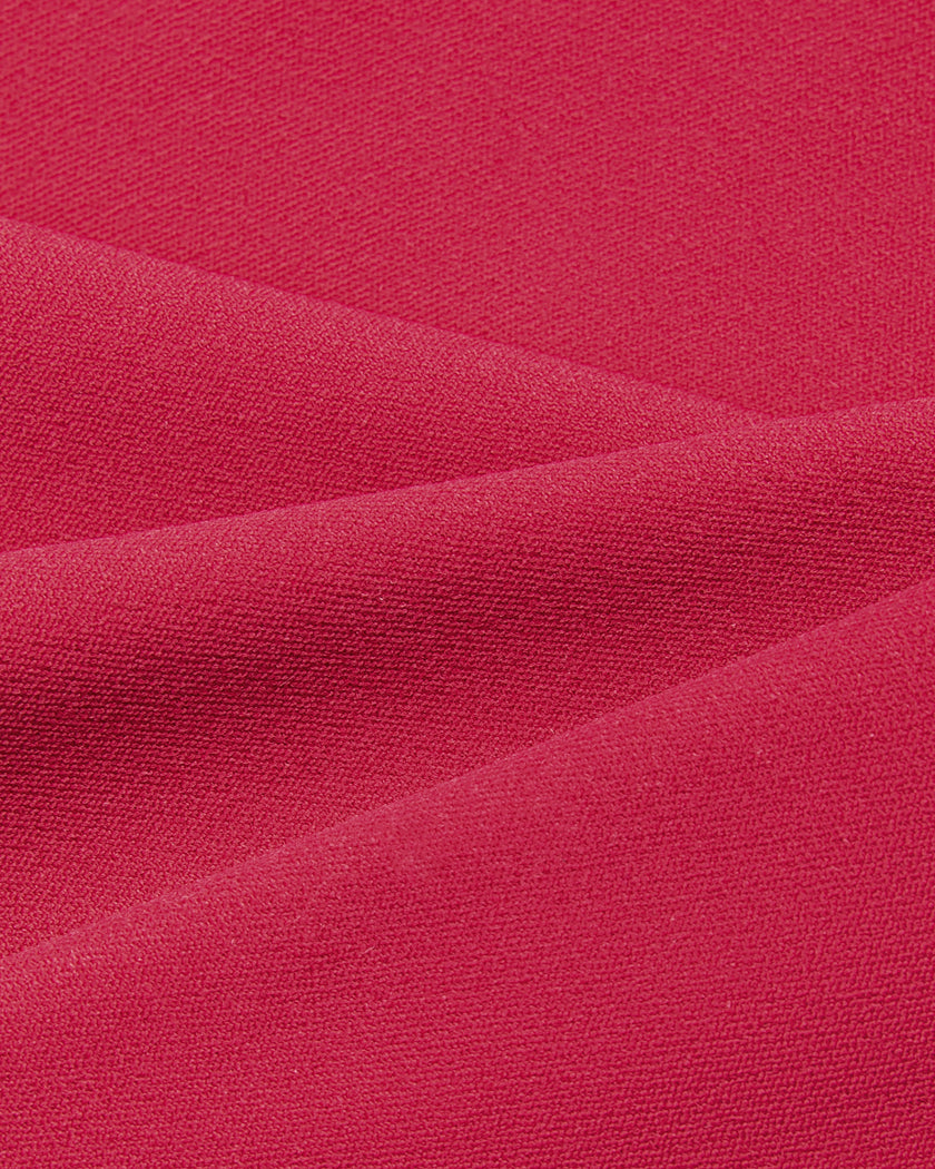 Close-up of the smooth stretch performance fabric on the Contour Yoga Tube Top in Rose Red