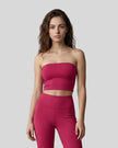 Model wearing the Contour Yoga Tube Top in Rose Red, front view