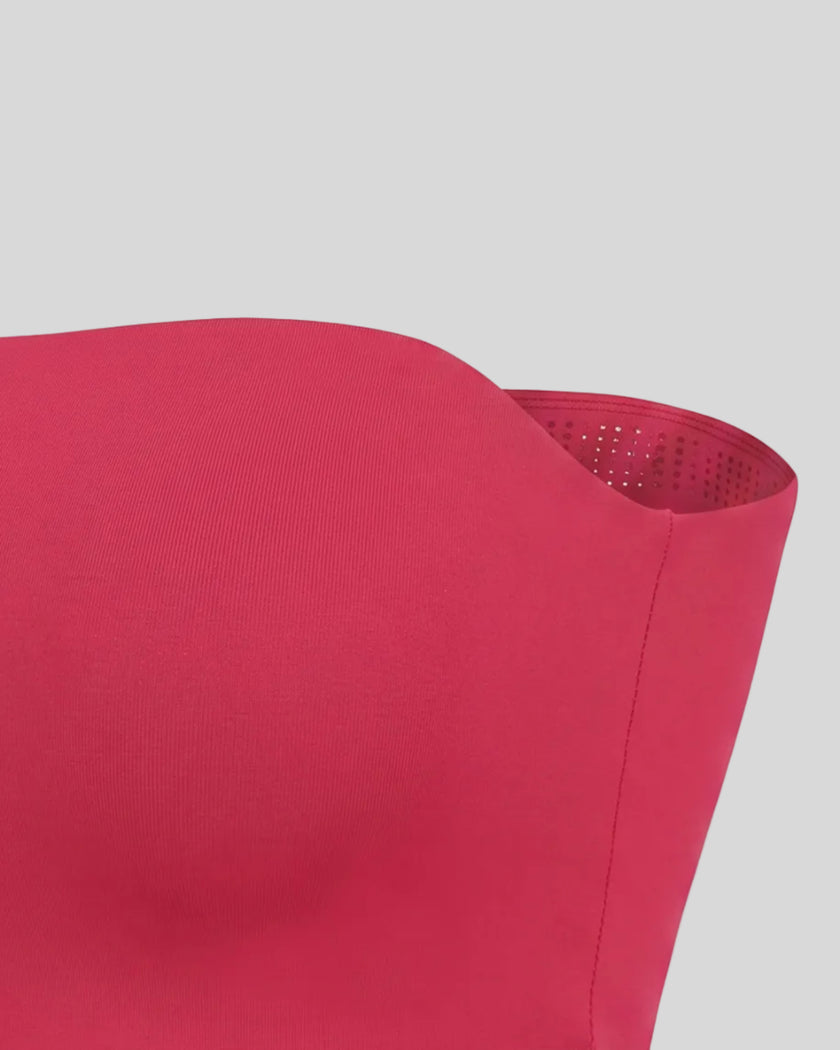 Side view highlighting the fitted silhouette of the Contour Yoga Tube Top in Rose Red