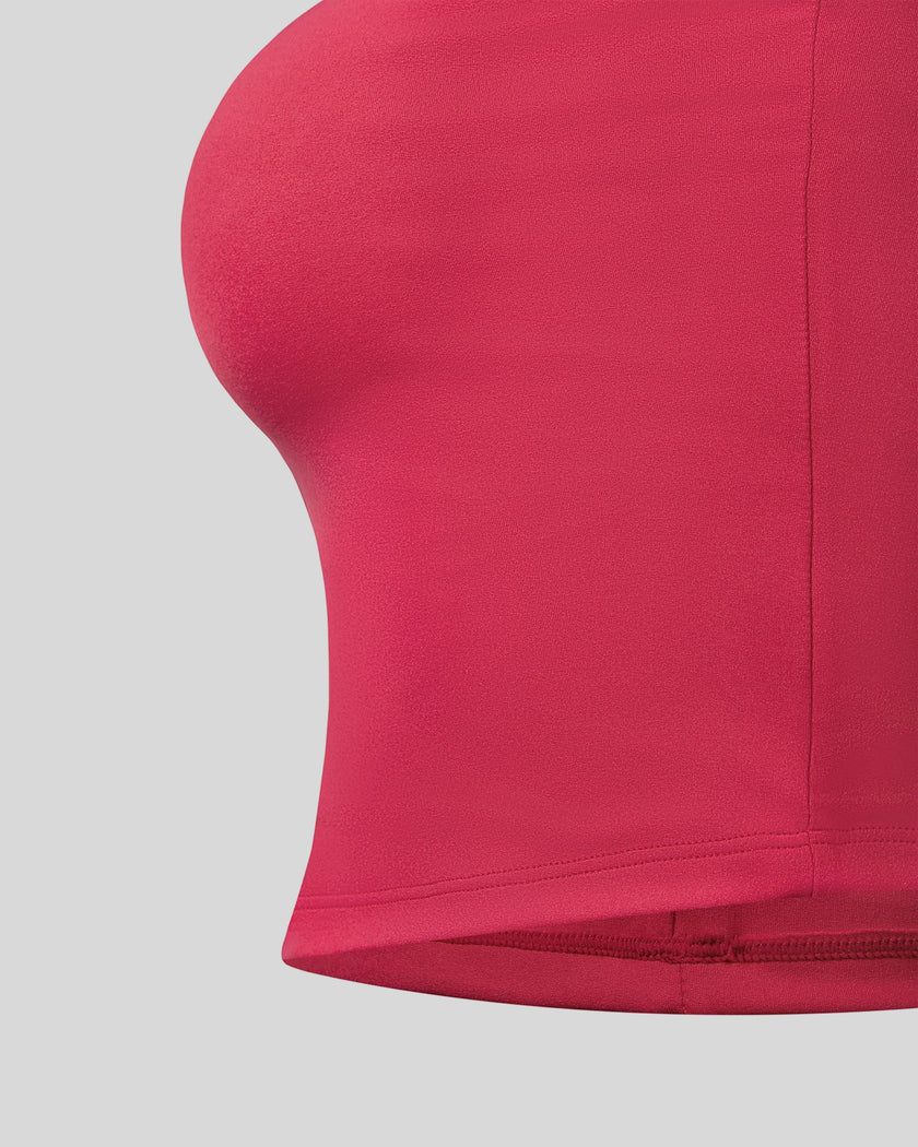 Close-up of the supportive underbust construction on the Contour Yoga Tube Top in Rose Red