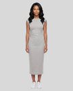 Woman wearing the ContourEase Ruched Maxi Dress in Flower Gray, front view showing slim fit and side ruching