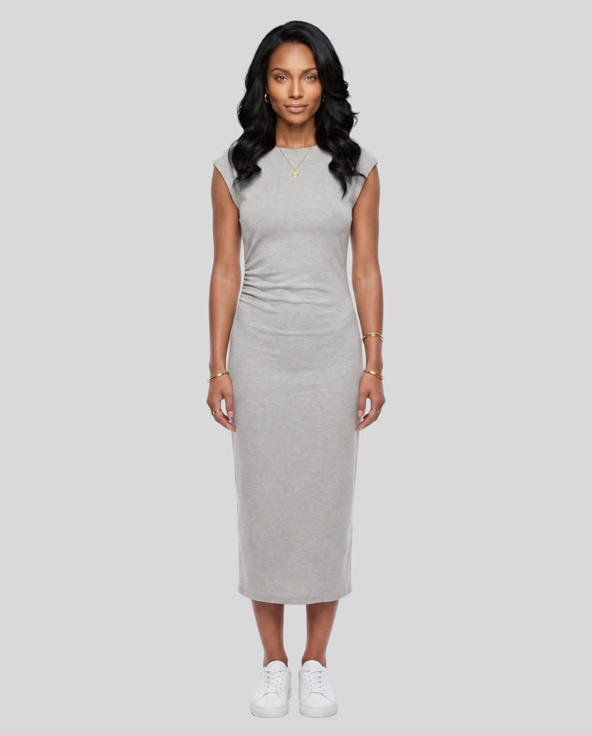 Woman wearing the ContourEase Ruched Maxi Dress in Flower Gray, front view showing slim fit and side ruching
